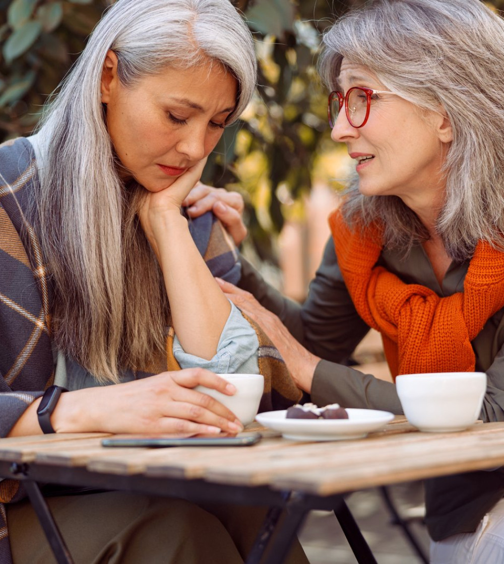 Two women sharing a supportive conversation